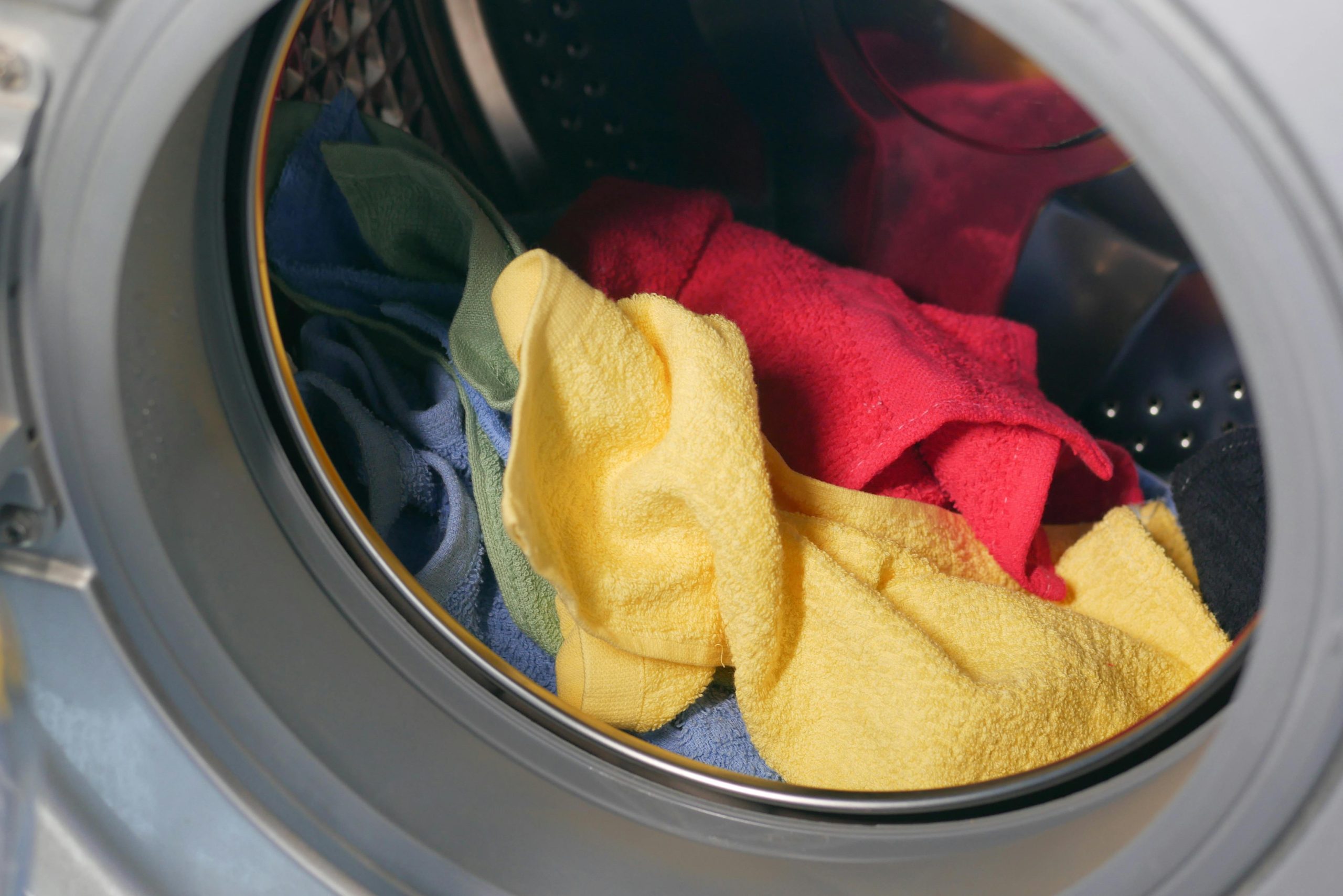 colourful towels in a washing machine